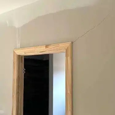 crack in drywall by door